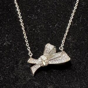 Elegant Silver Bow Pendant Necklace